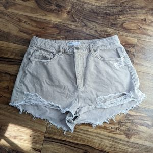 Distressed beige denim shorts